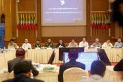 Tin Myo Win (C), vice chairman of NRPC, speaks during a meeting of the National Reconciliation and Peace Center (NRPC) and 8 Non Nationwide Ceasefire Agreement (NCA) ethnic armed organizations (EAOs) in Naypyitaw, Myanmar, 21 March 2019. Photo: Hein Htet/EPA