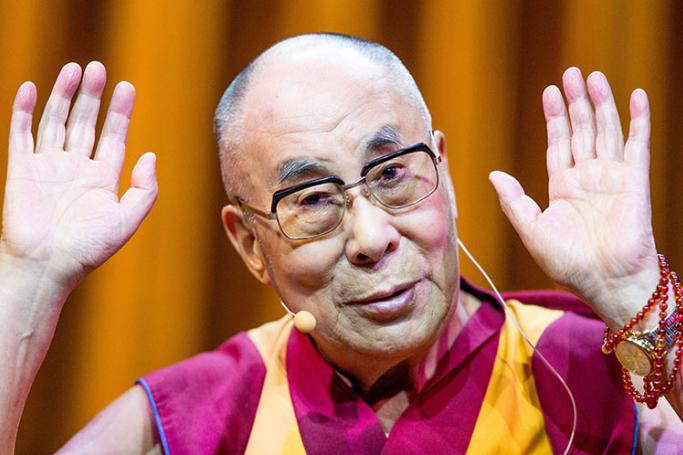 The Dalai Lama, the exiled Tibetan spiritual leader, gestures during a conference on Individual commitment and collective responsibility at Palais 12 in Brussels, Belgium, 11 September 2016. Photo: EPA
