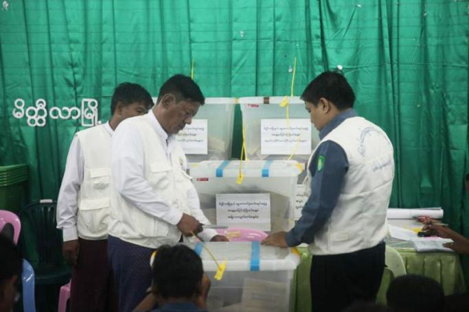 Officials at the office of the Meikhtila Township Election Commission on the evening of the election on Nov. 8. (PHOTO: Myanmar Now/Phyo Thiha Cho)