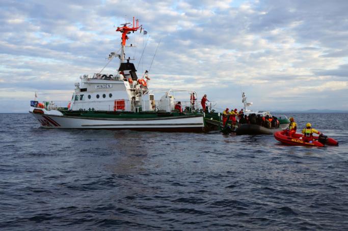 A picture made available on 25 March 2016 shows Frontex officials rescueing refugees in international waters near Lesbos island, Greece, 24 March 2016. Photo: EPA