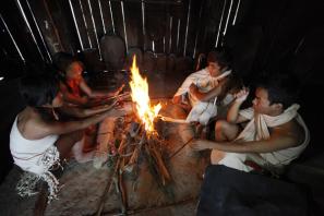 Young Chin people chilling out around the camp fire. Photo: Hong Sar