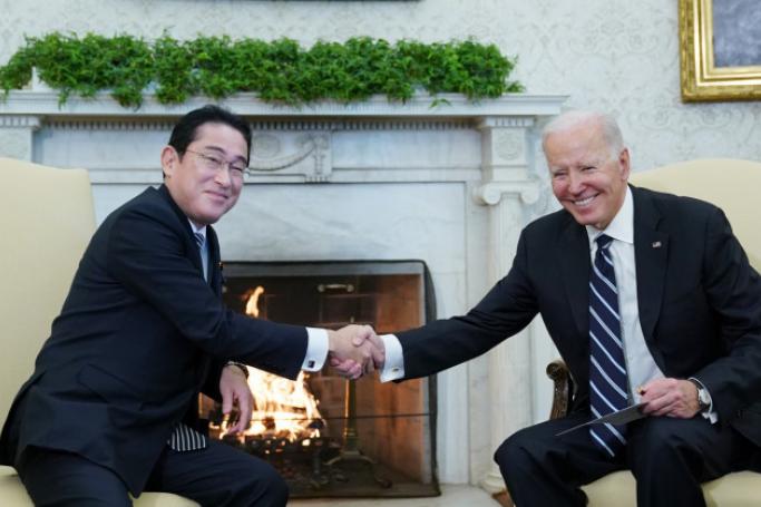 US President Joe Biden shakes hands with Japan's Prime Minister Fumio Kishida during a meeting in the Oval Office of the White House in Washington, DC on January 13, 2023. Photo AFP