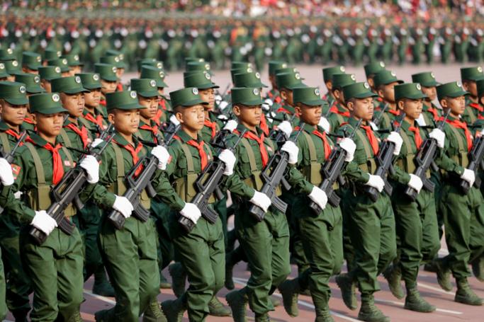 UWSA soldiers march in formation during a parade held to mark the 30th anniversary of Wa State in Panghsang, also called Pang Kham of autonomous Wa region, north-eastern Myanmar, 17 April 2019. Photo: Lynn Bo Bo/EPA