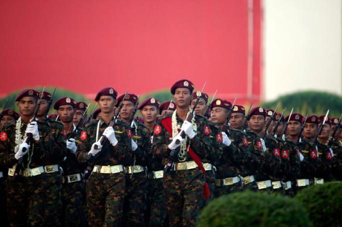 Myanmar soldiers march during a parade commemorating the 74th Armed Forces Day in Naypyitaw, Myanmar, 27 March 2019. Photo: Hein Htet/EPA