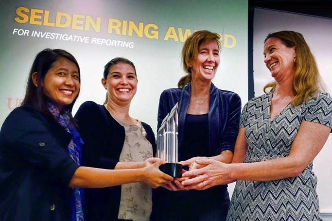 Left to right: AP’s Esther Htusan, Margie Mason, Robin McDowell and Martha Mendoza receive the Selden Ring Award for Investigative Reporting from USC Annenberg in Los Angeles on Friday, April 15, 2016.
