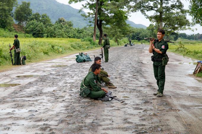 Myanmar Military troops​ take control the road along Kyee Ken Pyin police border guard post near Maungdaw town of Bangladesh-Myanmar border, Rakhine State, western Myanmar, 13 October 2016. Photo: Nyunt Win/EPA
