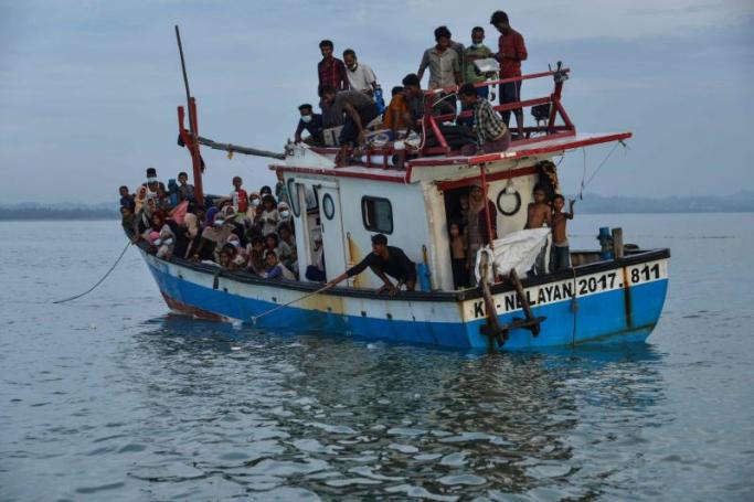 (File) A boat carryingg Rohingya people from Myanmar arrives on the shorelines of Lancok village, in Indonesia's North Aceh Regency on June 25, 2020. Photo: AFP