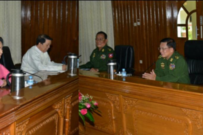 A handout picture provided by Myanmar Military News shows Myanmar opposition leader Aung San Suu Kyi (2-L) greeting Senior General Min Aung Hlaing (2-R) during their meeting in Naypyitaw, Myanmar, 17 February 2016. Photo: Myanmar Military News/EPA
