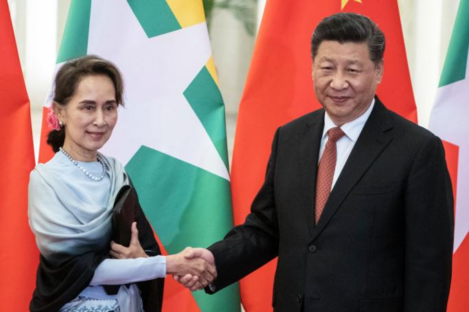 Chinese President Xi Jinping (R) welcomes Myanmar State Counsellor Aung San Suu Kyi (L) prior to their meeting at the Great Hall of the People in Beijing, China, 24 April 2019. Photo: EPA