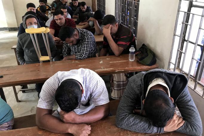 This photographs taken on January 3, 2020, shows Bangladeshi drug kingpins sitting in Teknaf. Dozens of drug kingpins have surrendered in Bangladesh's meth hub along the border with Myanmar, authorities said on February 4, amid growing fears over a Philippines-style violent crackdown against smugglers waged by police. Photo: AFP