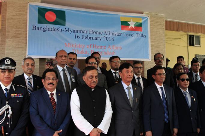 Myanmar home minister Gen Swe (C) and his Bangladesh counterpart Asaduzzaman Khan (3L) pose for a photo prior a meeting in Dhaka on February 16, 2018. Bangladesh February 16 handed over a list of more than 8,000 Rohingya to Myanmar as it moves to kick-start their repatriation weeks after the process was halted due to lack of preparation. Photo: AFP
