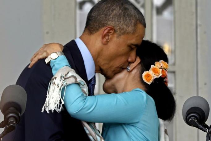 Washington Post questions US President Barack Obama's embrace of Myanmar. US President Obama (L) hugs Myanmar opposition leader Daw Aung San Suu Kyi during the joint press conference at Suu Kyi's residence in Yangon, Myanmar, November 14, 2014. Photo: Nyein Chan Naing/EPA 
