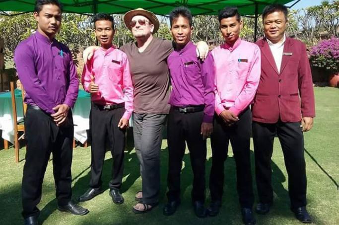 Bono with staff of Bagan Thiripyitsaya Sanctuary Resort in Bagan. Photo: Facebook
