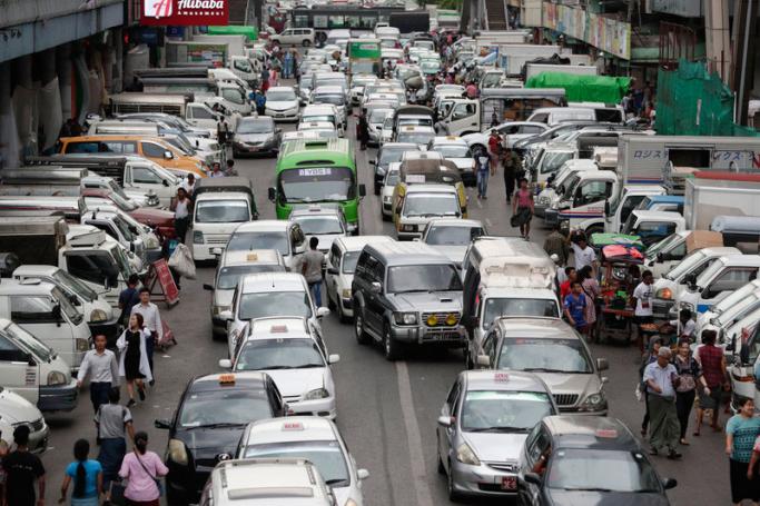 A traffic jam at a busy road of downtown area in Yangon. Photo: EPA