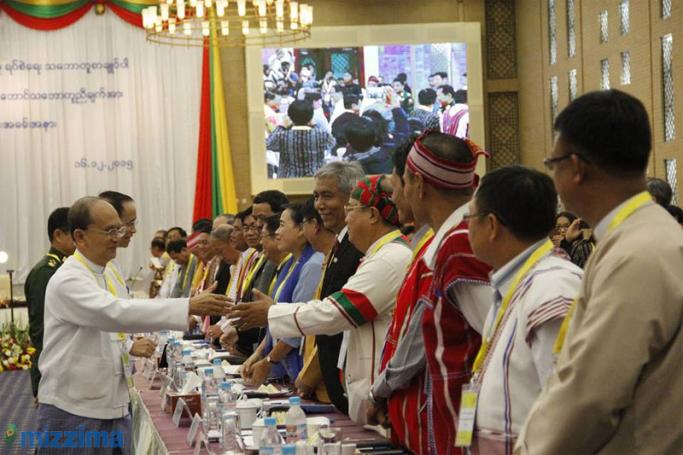 President U Thein Sein shakes hands with representatives of ethnic armed groups during the ceremony for the Framework for Political Dialogue submitted to the President at the Myanmar International Convention Centre in Nay Pyi Taw on 16 December 2015. Photo: Min Min/Mizzima
