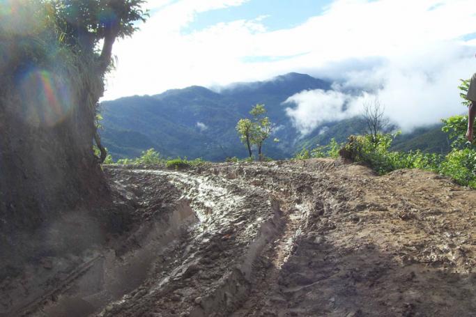 A muddy road near Tedim winds through the hills of Chin State. Photo: Mizzima
