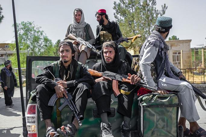  Members of the Taliban drive in the Pul-e-Charkhi prison in Kabul on September 16, 2021. Photo: AFP