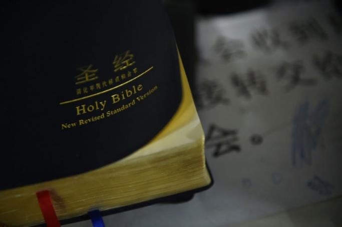 China's officially atheist government is wary of any organised movements outside its own control, including religious ones (AFP/File / GREG BAKER)