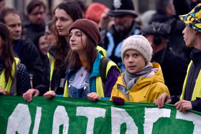 Climate campaigner Greta Thunberg marches with fellow activists in Bristol, Britain, 28 February 2020. Photo: EPA