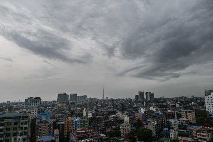 Cloudy sky is seen over Yangon at sun down. Photo: Ye Aung Thu/AFP
