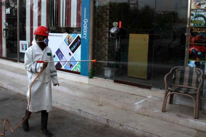 Pakistan officials spray disinfectant in public areas and house after authorities issued partial lockdown orders of Sindh province that is most effected by the COVID-19, in Hyderabad, Sindh Province, Pakistan, 18 March 2020. Photo: EPA
