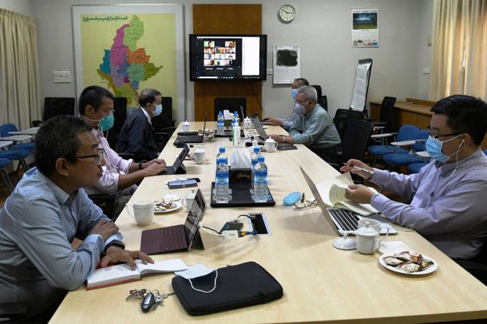 National Coordination Committee for negotiating COVID-19 measures with ethnic armed organizations (EAOs) holds an online video conference with the Pa-O National Liberation Organization (PNLO) yesterday. Photo: MNA