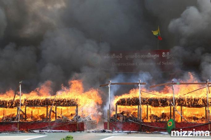 A pile of illegal drugs burn during a 'Destruction Ceremony of Seized Narcotic Drugs', held to mark the International Day against Drug Abuse, in Yangon on 26 June, 2019. Photo: Thet Ko/Mizzima