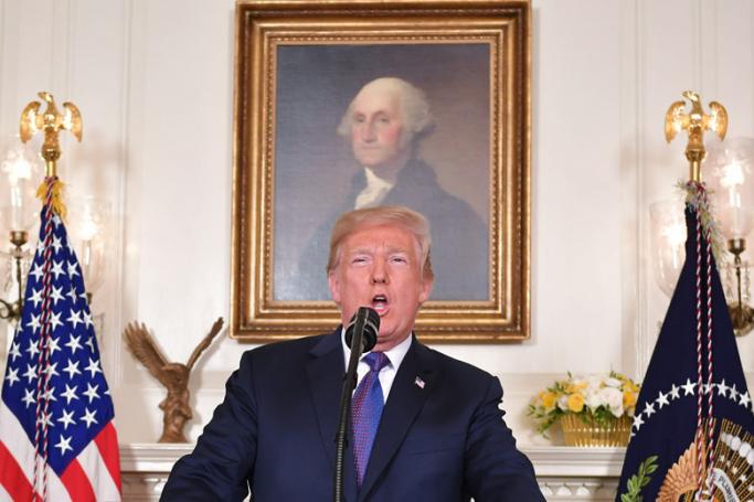 US President Donald Trump addresses the nation on the situation in Syria April 13, 2018 at the White House in Washington, DC. Trump said strikes on Syria are under way. Photo: Mandel Ngan/AFP
