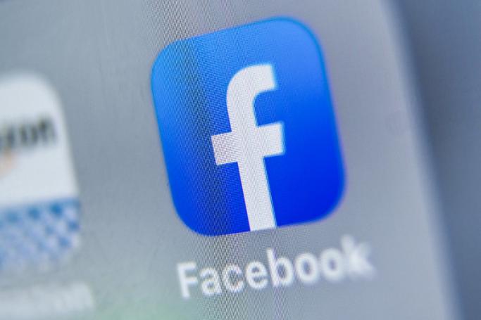 Logo of online social media and social networking service, Facebook displayed on a tablet. Photo: AFP