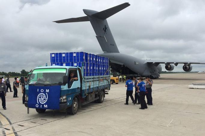 A plane load of 1,000 family kits donated by the Australian Government arrived in Yangon International Airport on August 10, 2015. Photo: IOM
