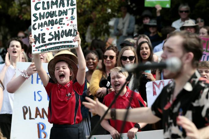 Students on stage lead young protesters in chants during a Global Strike 4 Climate rally at Civic Square in Launceston, Tasmania, Australia, 20 September 2019. It is estimated that more than 1,000 people were in attendance, among them many students who had left school to join the worldwide day of protest. The Global Strike 4 Climate is being held only days ahead of the scheduled United Nations Climate Change Summit in New York. Photo: Barbara Walton/EPA-EFE