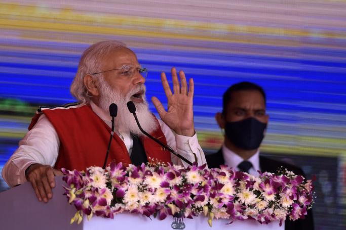 Indian Prime Minister Narendra Modi addresses the crowd during a campaign event in Silapathar, Dhemaji district, Assam state, India, 22 February 2021. Photo: EPA