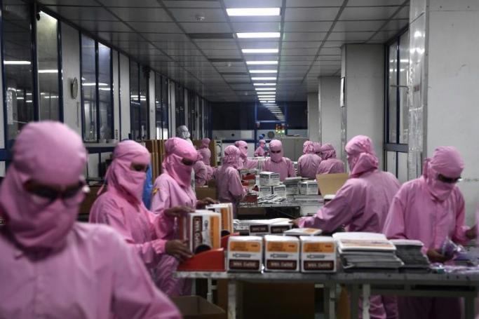 India's biggest syringe manufacturer is ramping up production to churn out a billion units, anticipating a surge in demand for coronavirus vaccinations (Photo: AFP)