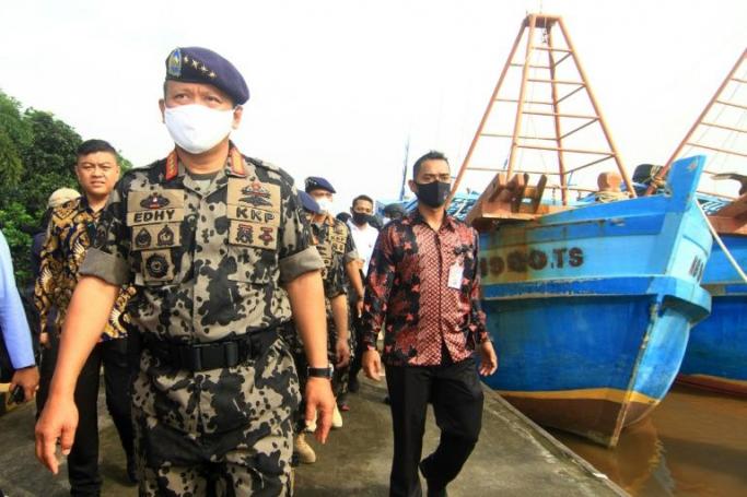 Indonesian maritime authorities boarded the boats on suspicion the crews had been operating illegally at the edge of the South China Sea (AFP Photo/LOUIS ANDERSON)