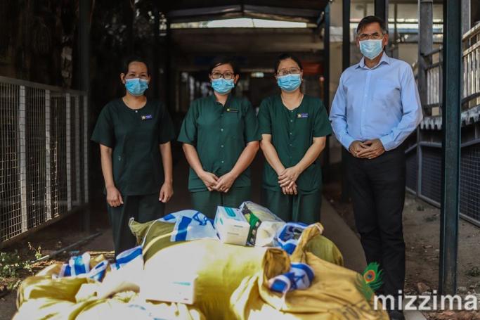 Israeli Ambassador Ronen Gilor, right, with medical equipment donations in Yangon. Photo: Thura for Mizzima