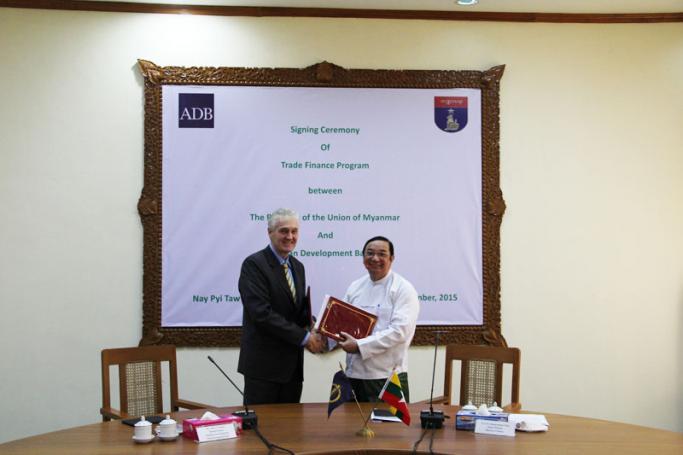 James Nugent, Director General of the Southeast Asia Department and Deputy Finance Minister Dr. Maung Maung Thein (Photo - ADB)
