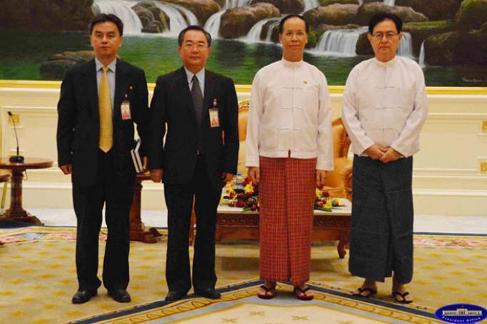 N Korean Ambassador Kim Sok Chol, second from the left, and Myanmar Vice President Sai Mauk Kham to his right in 2014. Photo: Myanmar President’s Office
