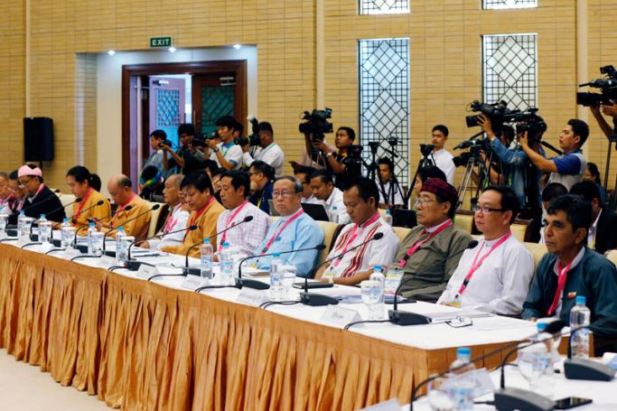 Members of Union Peace Dialogue Joint Committee (UPDJC) attend a  committee meeting in Naypyitaw, Myanmar, 15 July 2018. Photo: Hein  Htet/EPA 