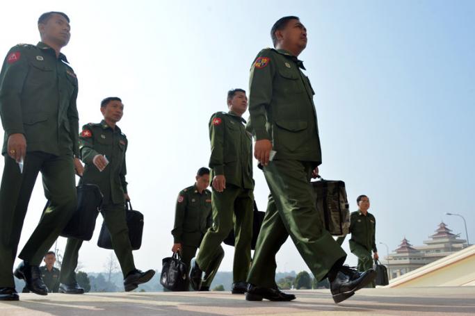 Military officers who are appointed members of the Myanmar Parliament arrive to attend a session in Naypyidaw on February 19, 2019. Photo: Thet Aung/AFP