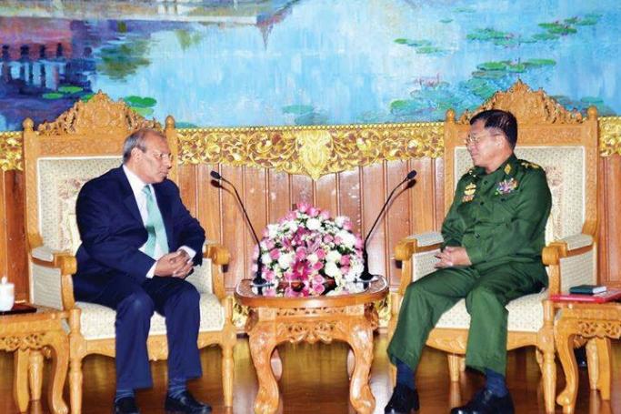Commander-in-Chief of Defence Services Senior General Min Aung Hlaing (R) meets with the Ambassador of India to Myanmar H.E Mr. Gautam Mukhopadhaya (L) at Bayintnaung villa, Nay Pyi Taw, on 25 June. Photo: Ministry of Information, Myanmar
