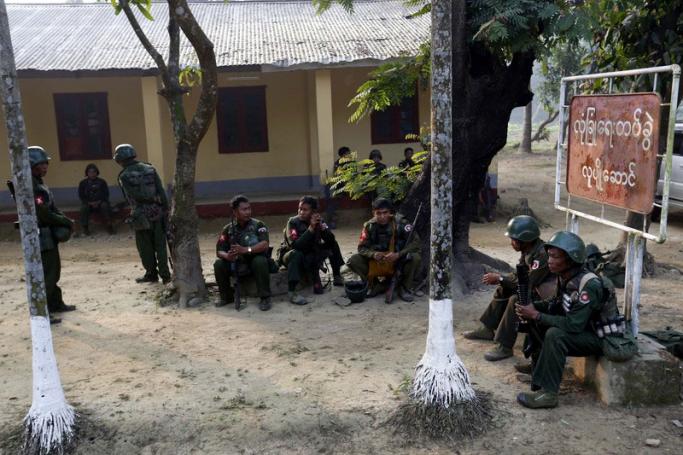 Myanmar soldiers relax inside the Kyee Ken Pyin police border guard post near Maungdaw town of Bangladesh-Myanmar border, Rakhine State. Photo: Nyein Chan Naing/EPA