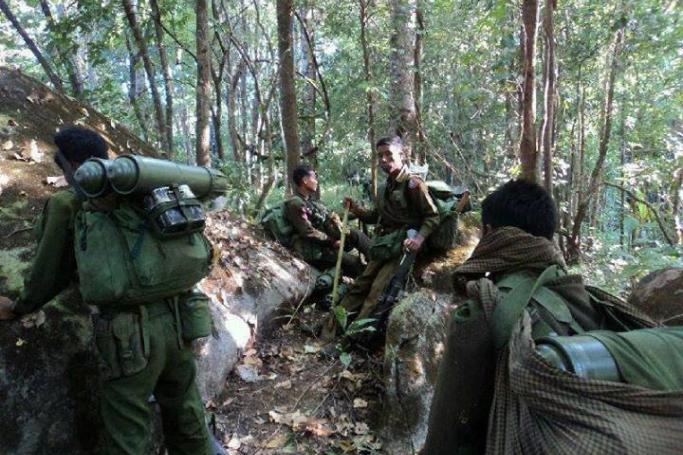 The Myanmar military has been attacking Kachin positions in Kachin State, despite ongoing peace talks. Myanmar army soldiers on a trail in Kachin State. Photo: Kachin Soldiers

