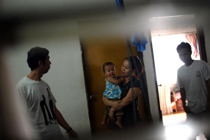 (File) A refugee family from Myanmar's ethnic Chin tribe spend their afternoon in a small apartment that houses more then twenty asylum-seekers in down town Kuala Lumpur. Photo: AFP