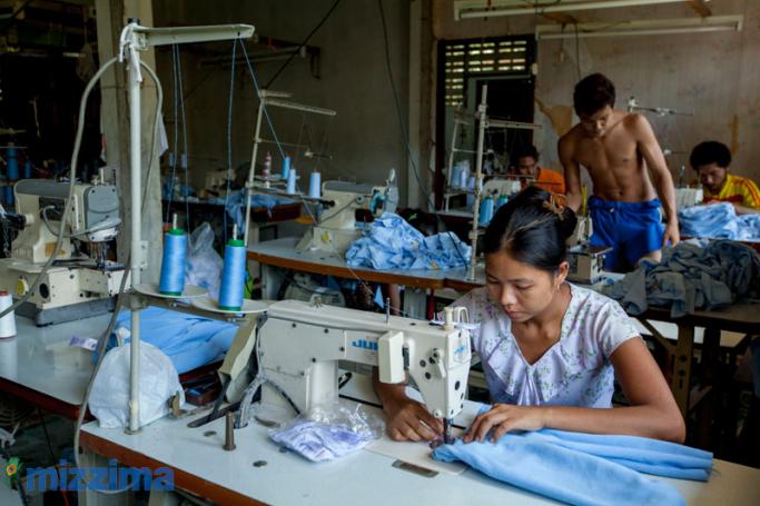 Myanmar migrant workers work at a garment factory in Mae Sot, Thai Myanmar border. Photo: Hong Sar/Mizzima
