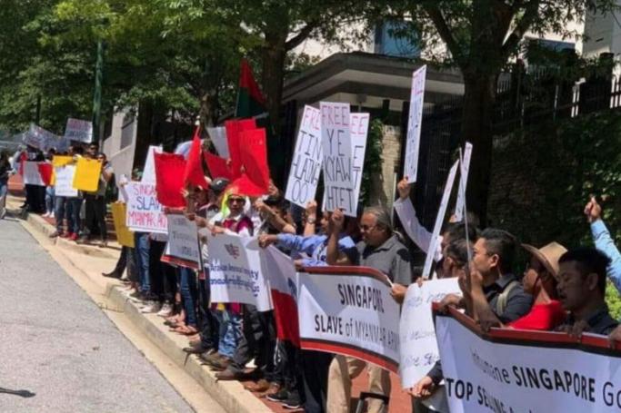 A group of Myanmar nationals staged a protest in front of the Singapore Embassy in Washington DC on July 15. Photo: Voice Of Arakan/Twitter