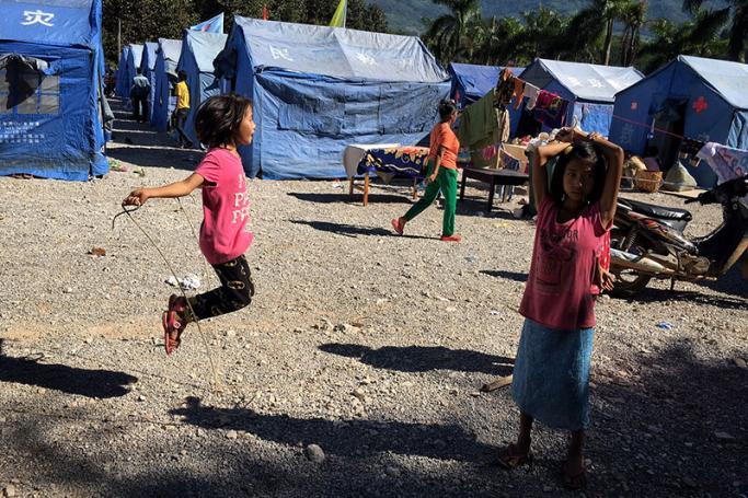 Myanmar girl skipping in a refugee camp near the border of China and Myanmar in Wanding town, Ruili city of Yunnan province in southwest China, 21 November 2016. Photo: EPA
