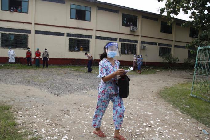 A Covid-19 patient walks out after being discharged from Sittwe hospital, Sittwe, Rakhine, Myanmar, 08 September2020. Photo: Nyunt Win/EPA