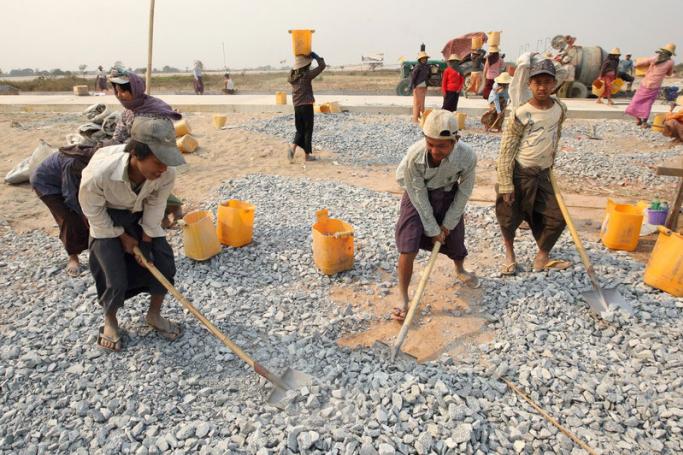 Myanmar child labourers working at a construction site in Taunggo city, Myanmar. Photo: EPA
