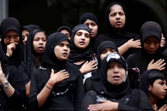 Myanmar Shiite Muslim girls react as they take part during the Ashura commemoration in Yangon, Myanmar, 04 November 2014. Photo: Lynn Bo Bo/EPA
