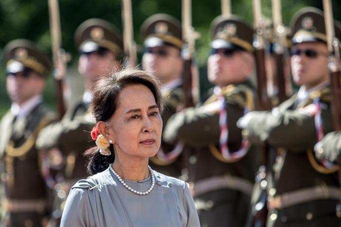 (FILE) - Myanmar's State Counselor Aung San Suu Kyi inspects a guard of honor during a welcome ceremony in Prague, Czech Republic, 03 June 2019. Photo: EPA